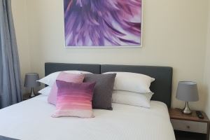 The Bedroom of Mayfield Short Stay Apartments.